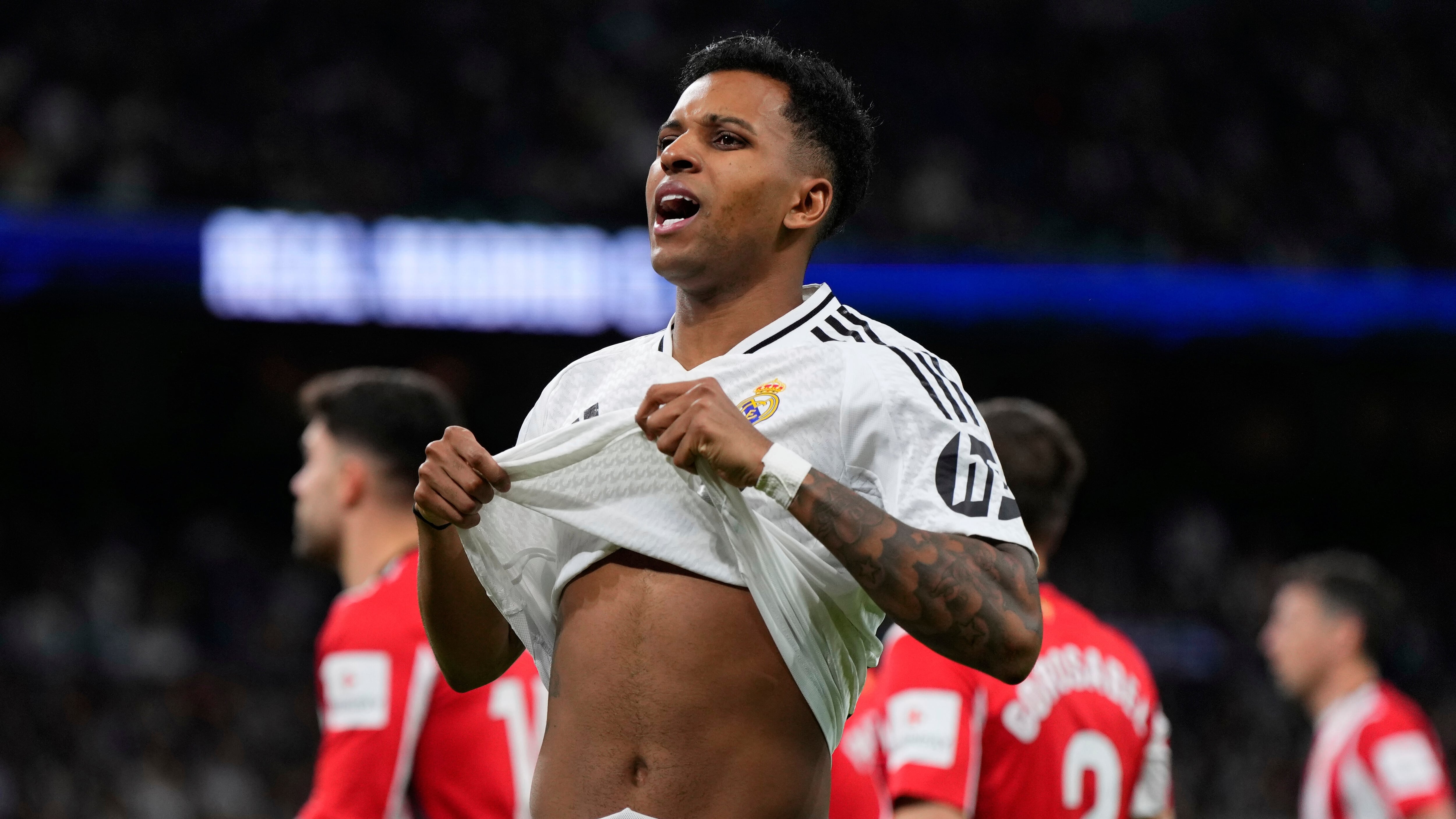 Real Madrid's Rodrygo reacts after missing a chance to score during the Spanish La Liga soccer match between Real Madrid and Athletic Bilbao at the Santiago Bernabeu stadium in Madrid, Sunday, April 20, 2025. (AP Photo/Manu Fernandez)