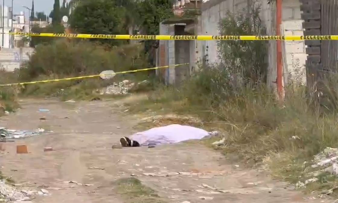 Investigan como feminicidio el hallazgo de una joven asesinada a balajes en camino rural